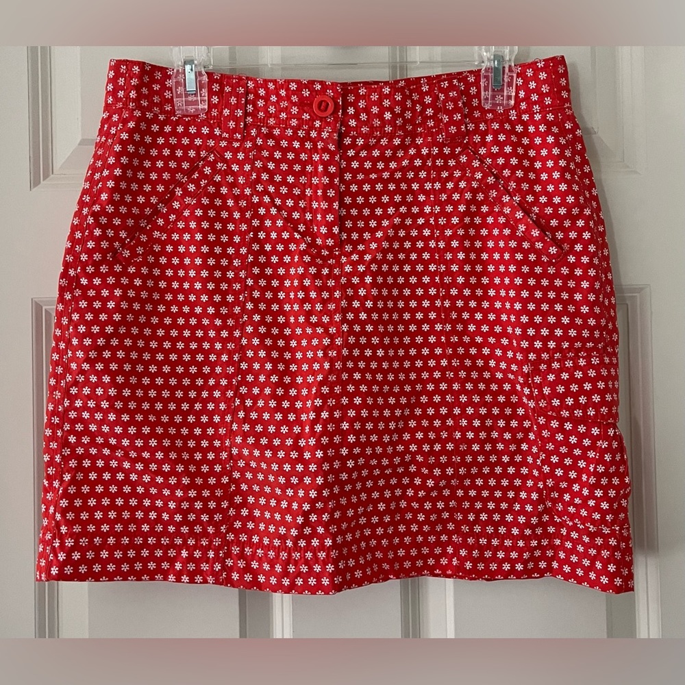 Women’s Lands End orange Skort with white flowers, size 6 tennis activewear
